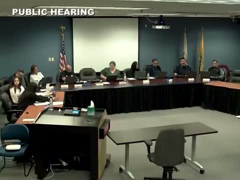 Commission approves variance for corner‑lot single‑family house with reduced setbacks and driveway depth