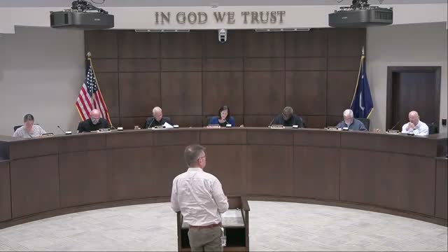 Commission approves driveway‑separation waiver for proposed Dashing Food Store on Highway 21