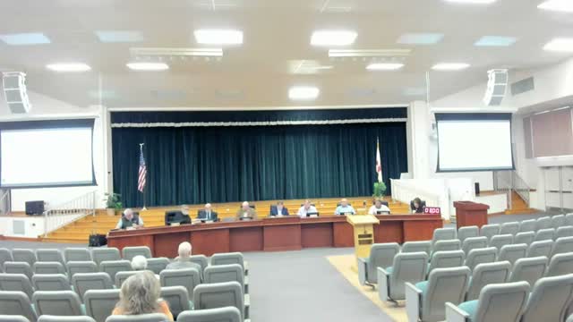 Columbia County commissioners unanimously back public‑works official Kevin Kirby after heated accounting dispute