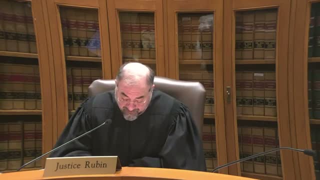 Appeals court considers whether homeowner has standing to challenge school expansion that fills neighborhood open space