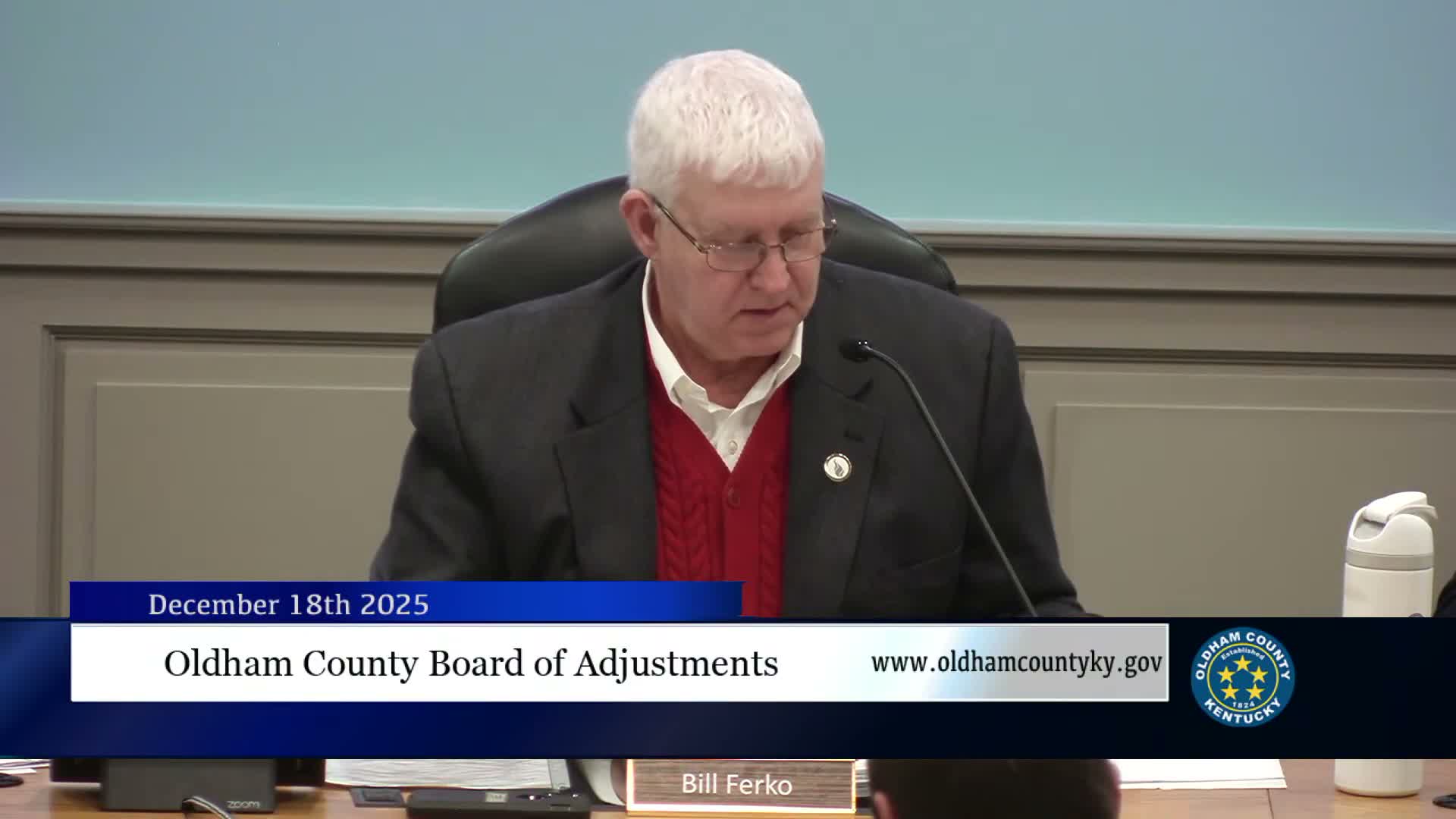 Board grants 21-foot rear-yard variance for five‑unit apartment on W. Highway 146 with CSX condition