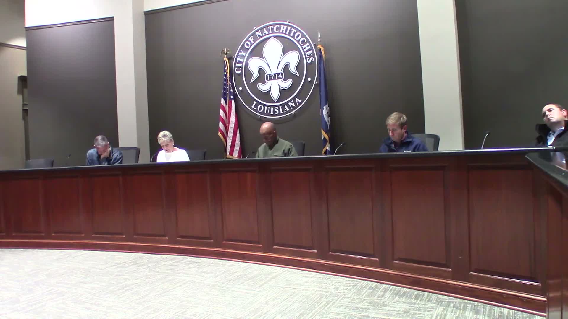 Historic commission approves gravel driveway and repaint in same colors for 208 Poet Street; rear building left for further review