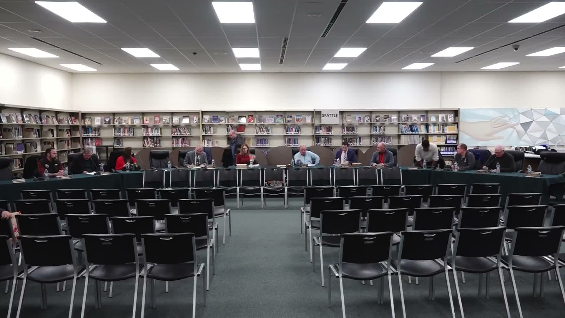 Board reads resolution to disenroll three students after residency hearings; adds resolution to meeting agenda and approves