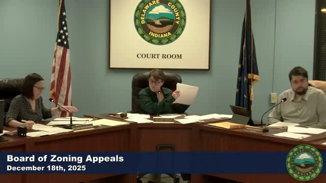 Delaware County BZA OKs six‑month business variance for tree service after neighbors complain of smoke and piles of wood