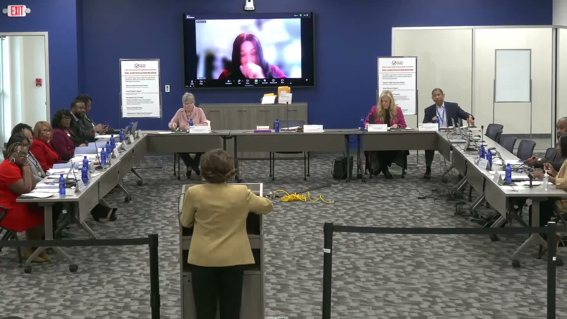 Trainers and observers warn Fulton County board about early-voting changes; officials cite seals and SOP protections