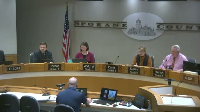 After contentious public comment, Spokane County adopts amended public‑defender case‑weighting draft 3–2