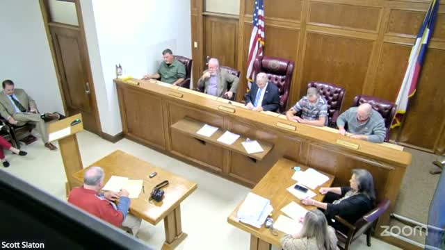 Commissioners award unblended road oil bid to Blazer Resources and debate procurement rules for volatile commodities