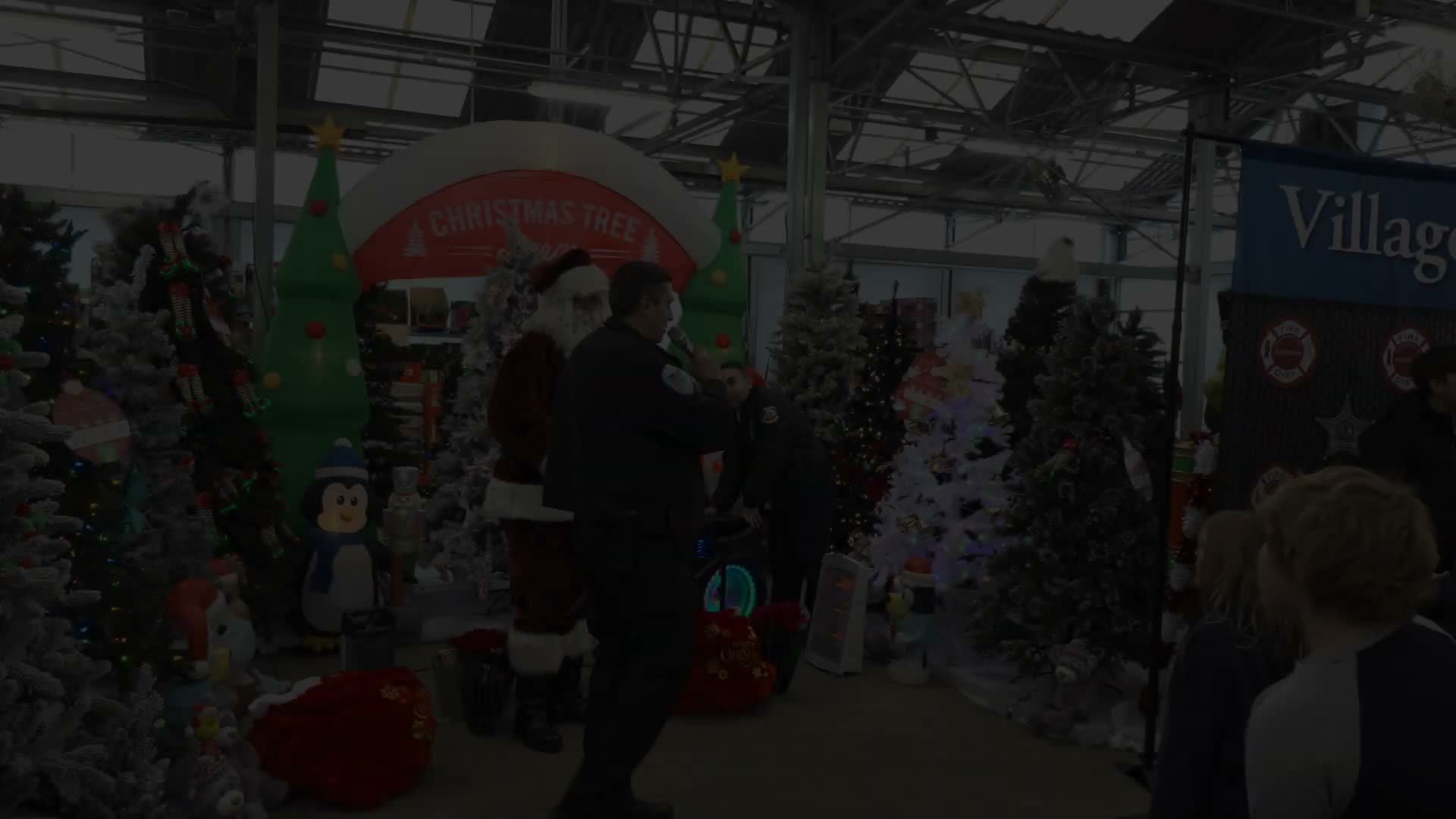 Addison police, firefighters and volunteers host "Shop with the Hero" holiday event at Walmart