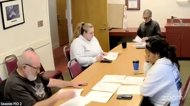 Committee reviews Seaside marketing results, guide production and budget-request timeline