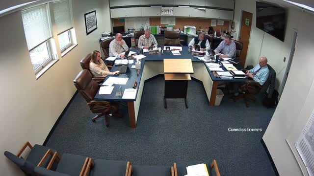 Coffey County commissioners debate compressing salary steps from 22 to 15; staff to return cost estimates