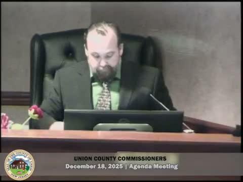 Union County commissioners honor longtime employee, thank food‑drive partners