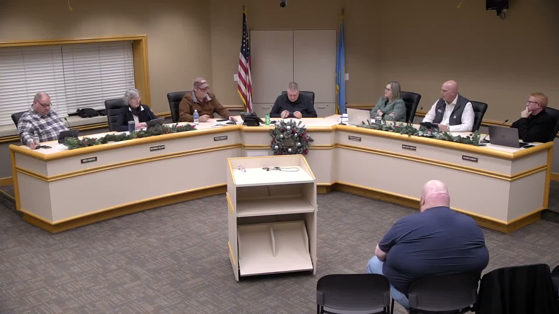 Utilities commissioner reports on solid waste, water and library accomplishments