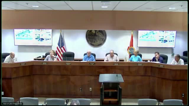 Code enforcement issues 104 warnings during ordinance education period; board debates clarity, landscaper responsibilities and parking enforcement