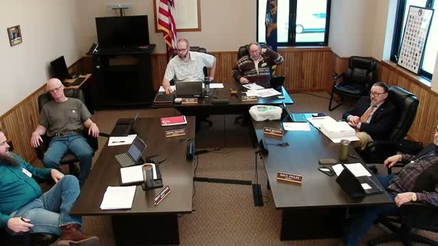 Board approves short‑term wage adjustment for jail nurse after vigorous debate