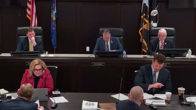 Resident urges salary board to reinstate employee performance evaluations; controller says departments already review staff