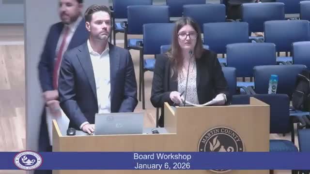 After carrier switch to Cigna, district faces high loss ratio; consultants present a 10% cap offer and policy options