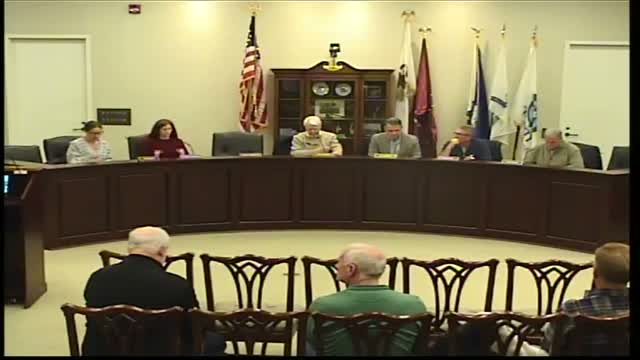 Historic preservation panel approves interior window graphics for Hinsdale Barbershop