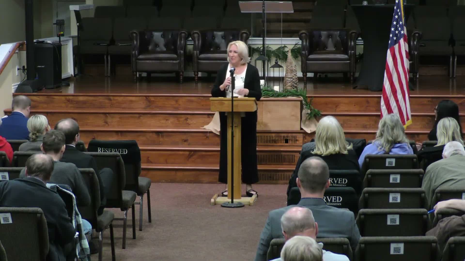 State Rep. Carrie Ann Lisenby outlines bills on school health curriculum, voter‑roll cleanup and redistricting at Davis County forum