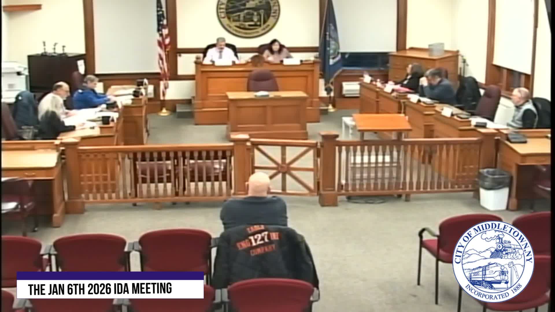 Middletown IDA administrative director reports near‑100% contractor compliance; board approves routine FedEx payment