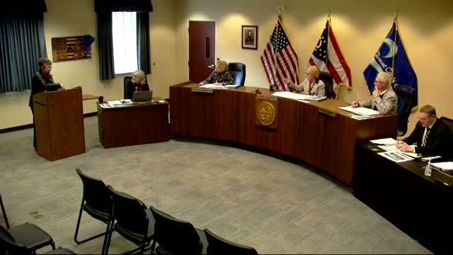 Resident raises blight and unused water‑tower concerns; commissioners promise follow-up