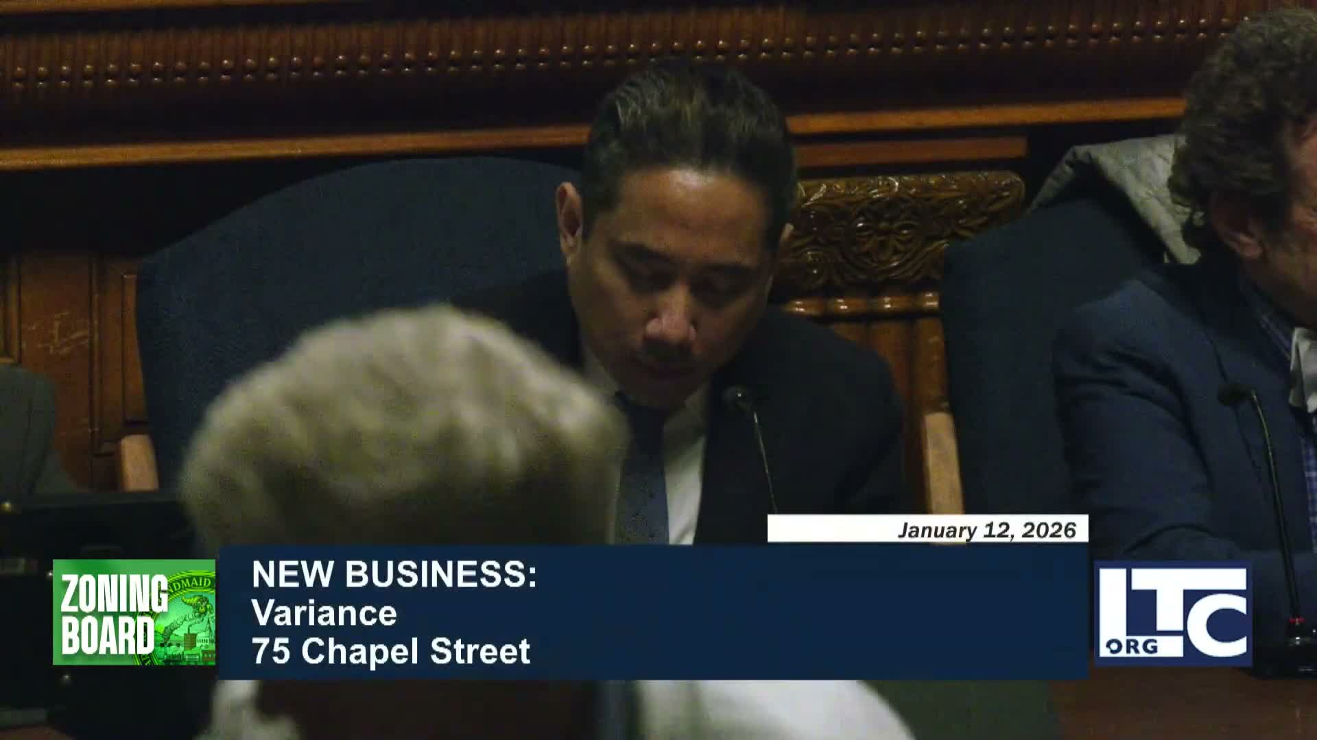 Lowell ZBA approves stacked‑parking variance for 75 Chapel St., adds signage and tree conditions