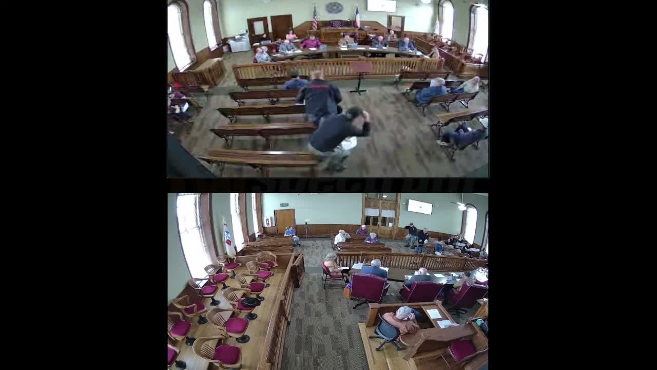 Commissioners debate copier lease addendum for Emergency Operations Center