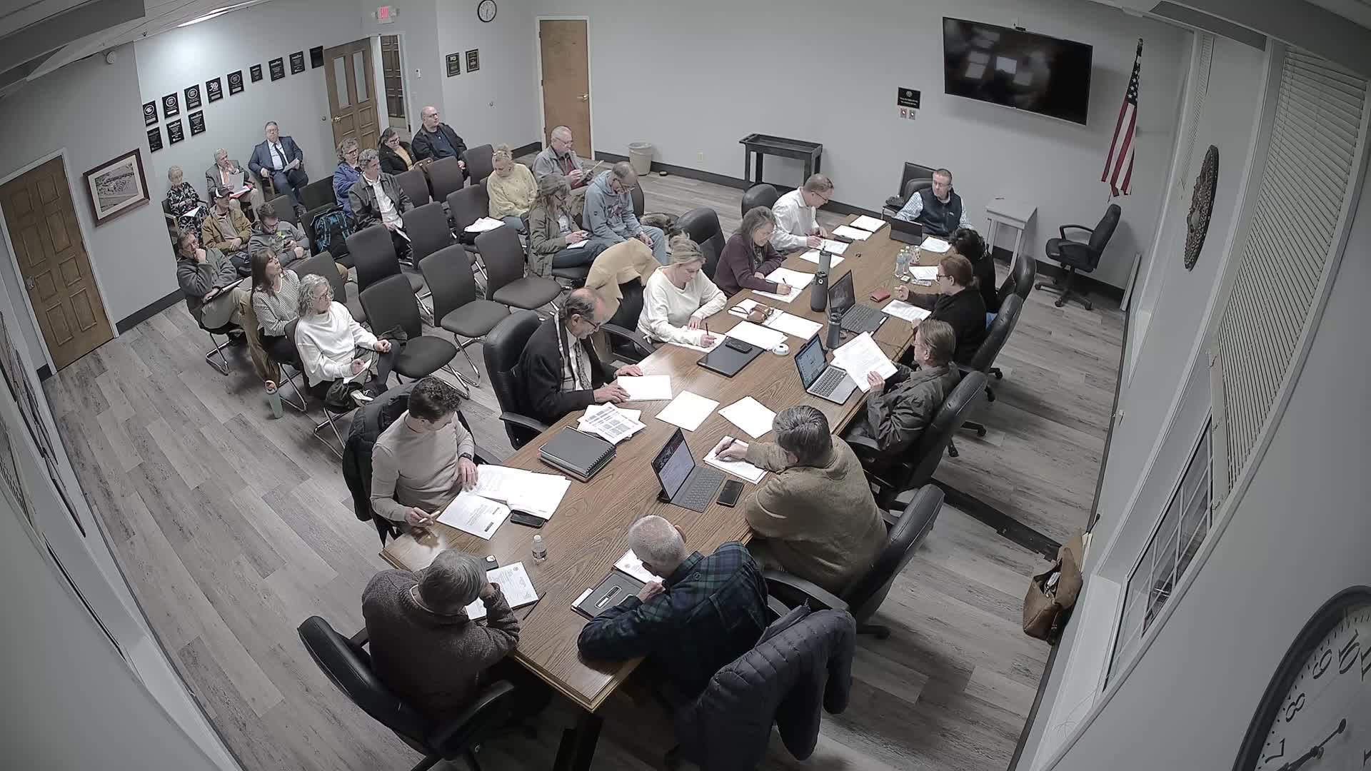 Commission approves architect fee and directs $5,000 access payment for historic-house work after debate over authority