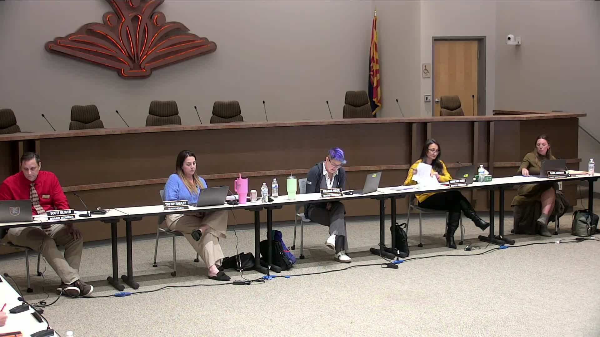 Higley board hears first reads on fingerprinting and certification policies; trustees seek clearer tiering and waiver language
