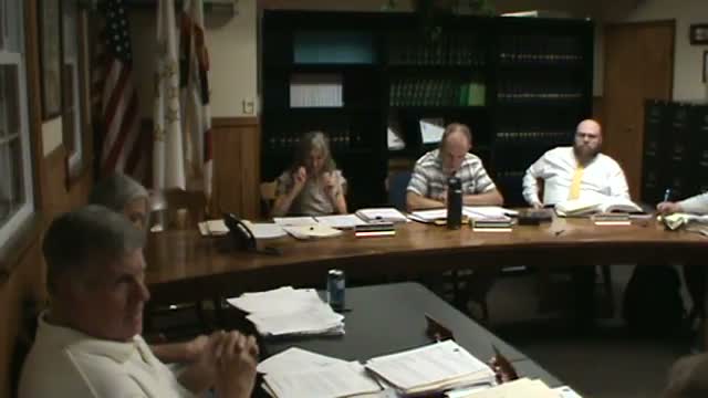 Council authorizes bids for two dump trucks and approves line‑striping bid participation