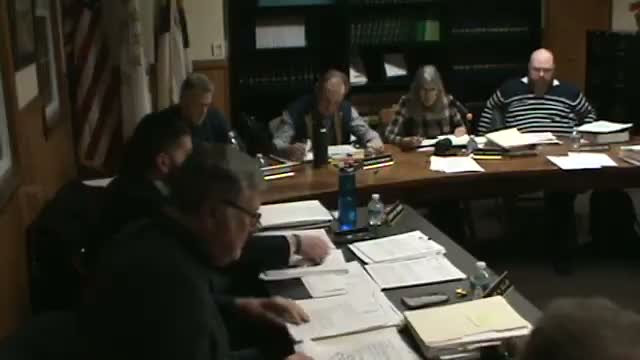 Exeter approves paving and chip‑seal contracts and authorizes purchase of two heavy trucks