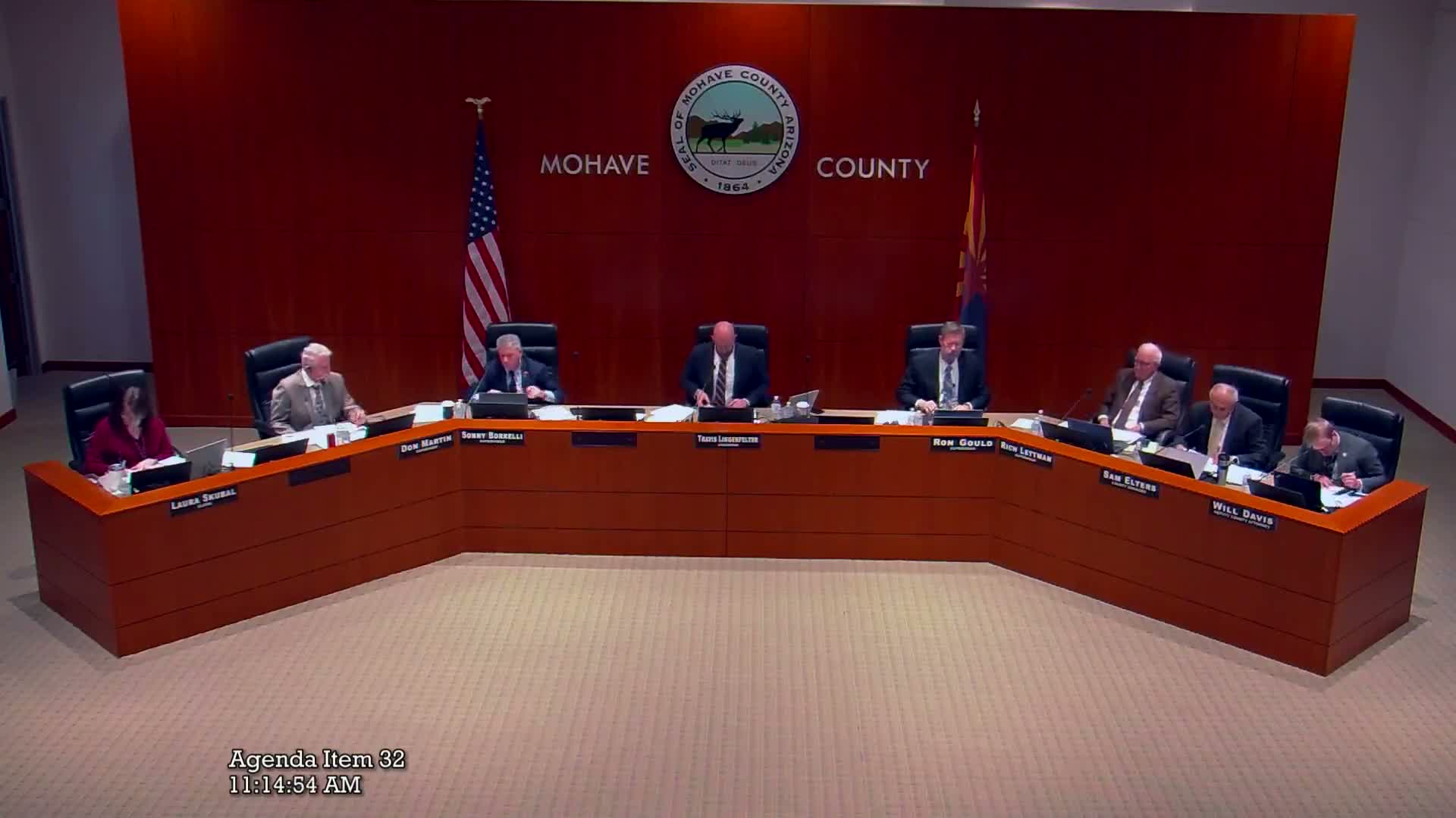 Mohave County asks staff to work with cities after debate over flood‑control allocation formula