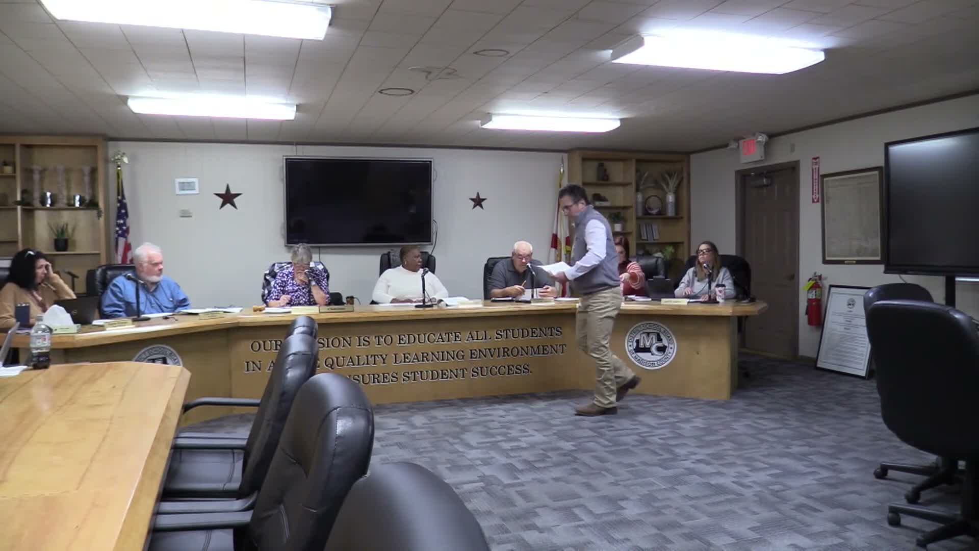 District finance staff report midyear budget variances, propose amendments; carrying costs for idle schools cited