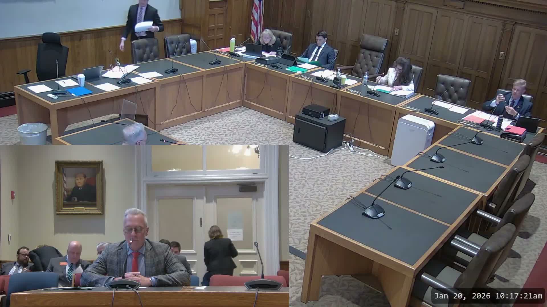 Municipal association, fire chiefs oppose bill to forbid road‑length and lot caps; builders support flexibility