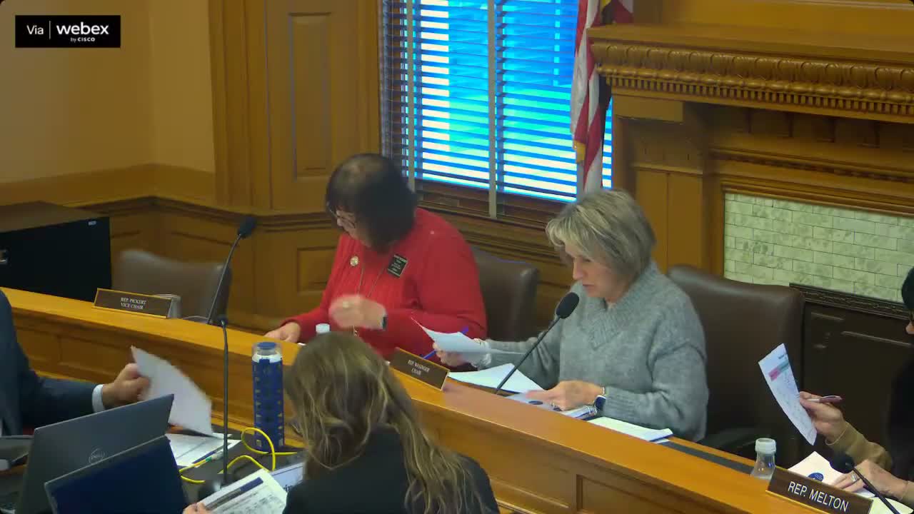 Budget committee trims five long‑vacant Kansas Lottery FTEs, approves budget with amendment