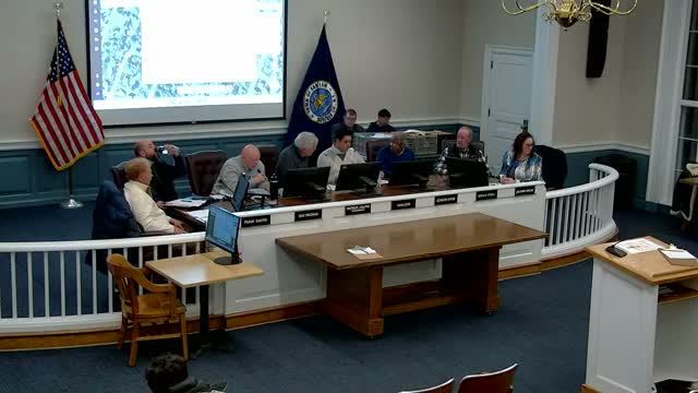 Mystique Enterprises seeks property‑line adjustment to create two conforming lots; planning board reserves decision