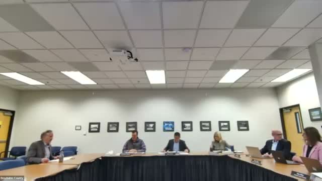 Treasurer and CFO report: county finances largely on target; staff flag macro risks and staffing reductions