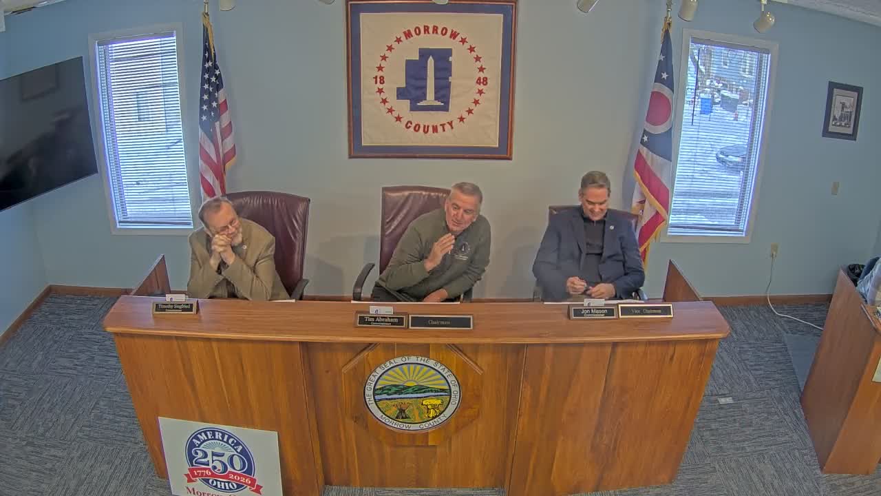 County staff report delayed evidentiary hearing and planned grant briefing; building move mostly complete