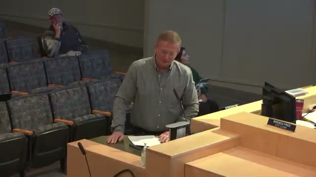 Business owners press council as staff advances downtown parking plan; wayfinding subcommittee formed