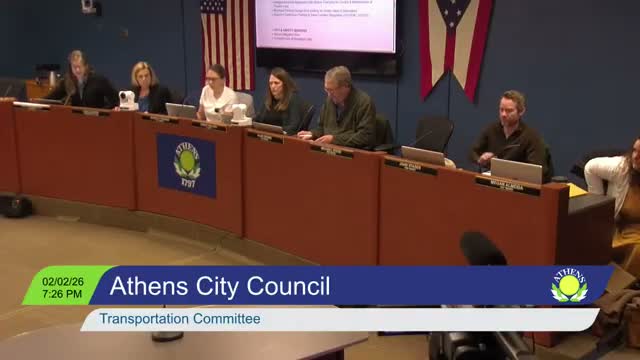 Council committee moves Theater Lane annexation IGA forward and outlines free‑parking dates for December 2026