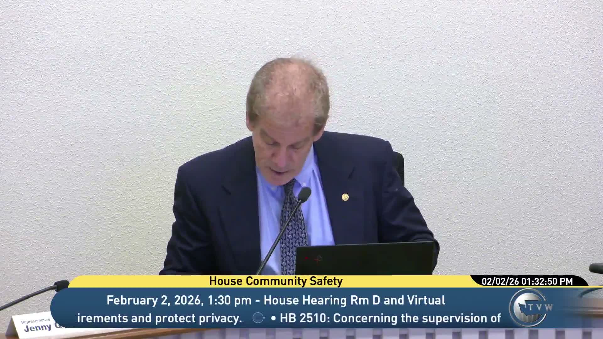 House committee reports out substitute expanding earned-release time and creating peer-support pilots, amid split over limits