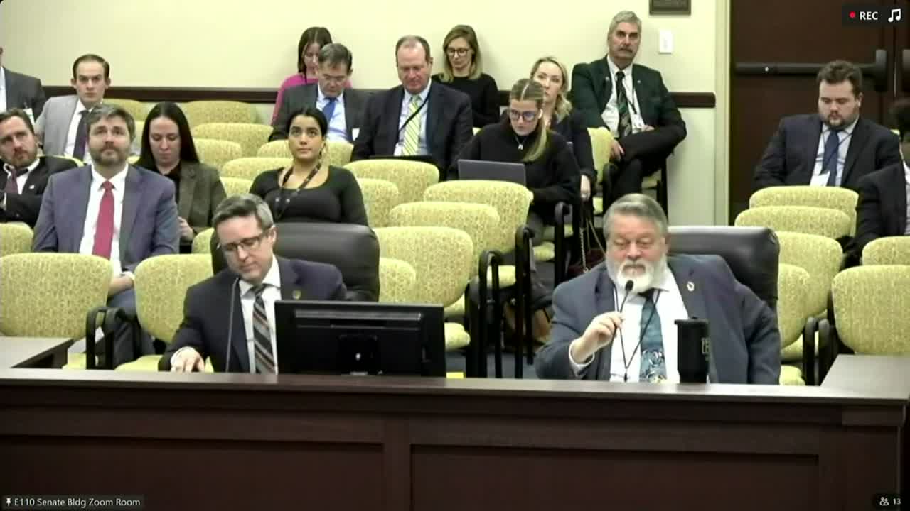 Committee advances short bill creating affirmative defense for conduct authorized by statute, drawing sharp public pushback