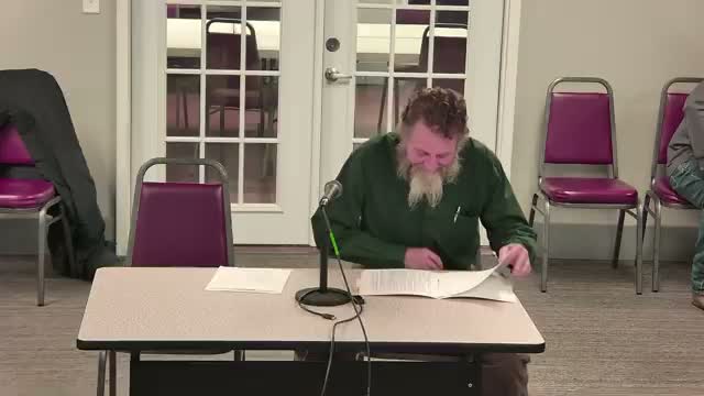 Council forms building-code review committee to recommend code year; staff flags ISO and cost trade-offs