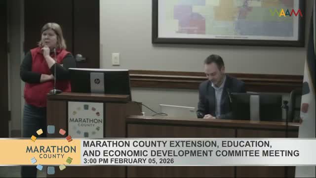 UW Extension reports AED hire in progress and flags housing summit training