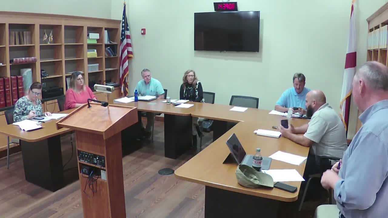Residents and commissioners raise safety concerns at steep railroad-adjacent driveway