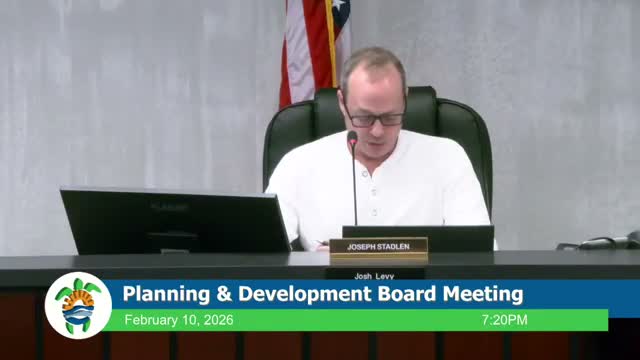 Planning board denies variance for proposed 4‑story, 22‑unit building after neighbors raise flooding and compatibility concerns