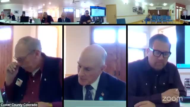 Custer County adopts series of employee-handbook resolutions covering telework, FMLA, ADA, workers' comp, travel, vehicle use and PTO