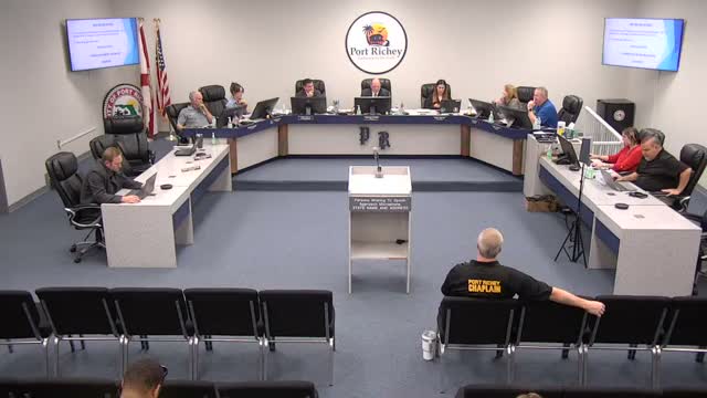 Port Richey CRA narrows branding signs; board favors blue frame and requests night renderings