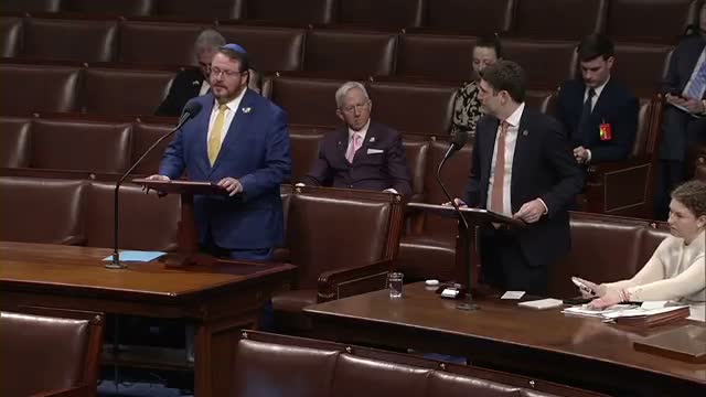 Unidentified committee member urges passage of bill requiring photo ID to vote and proof of citizenship to register