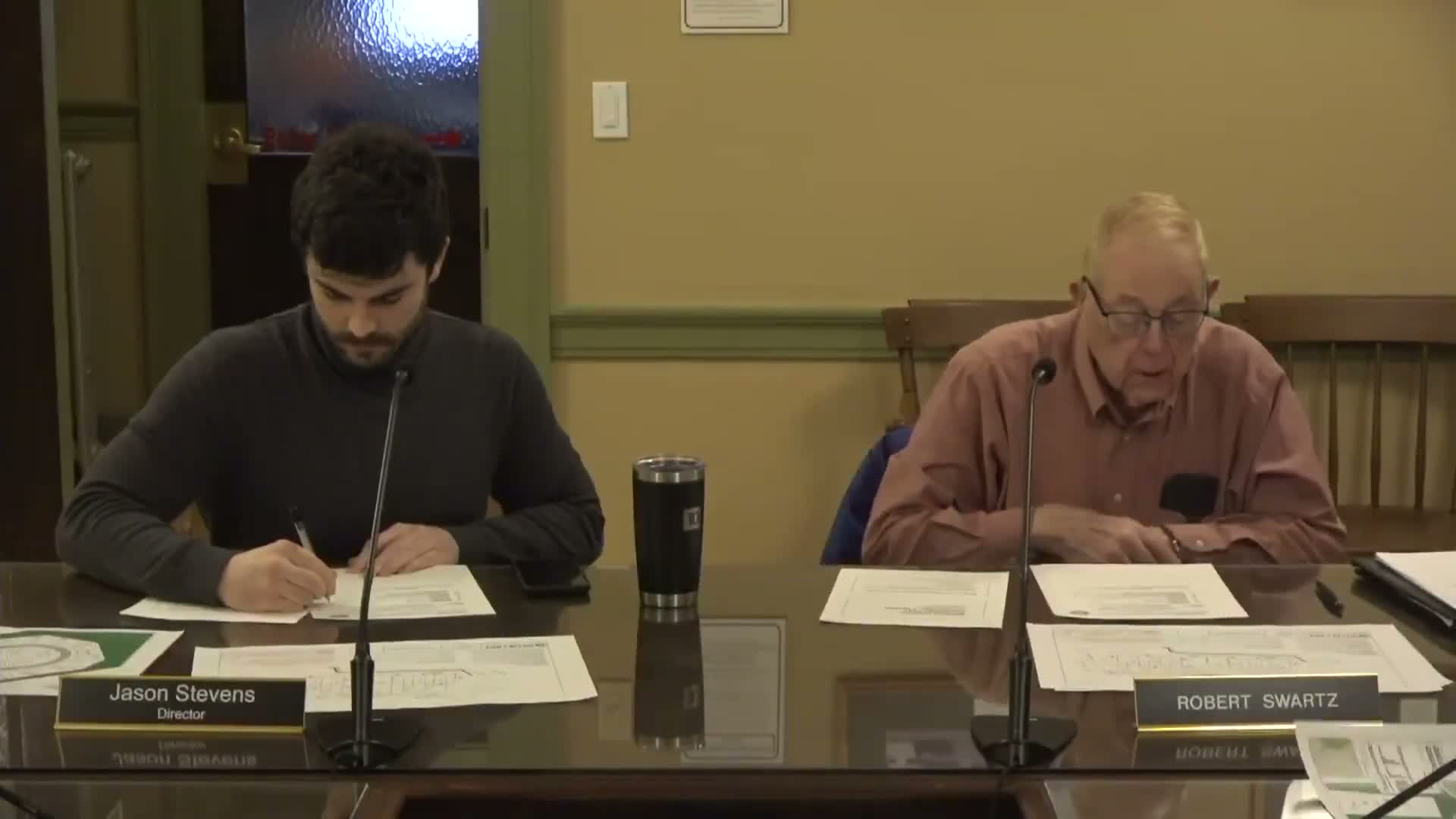 Staff describes 5‑foot footprint change on Elmwood/Emerald Street project; ZBA relief expected