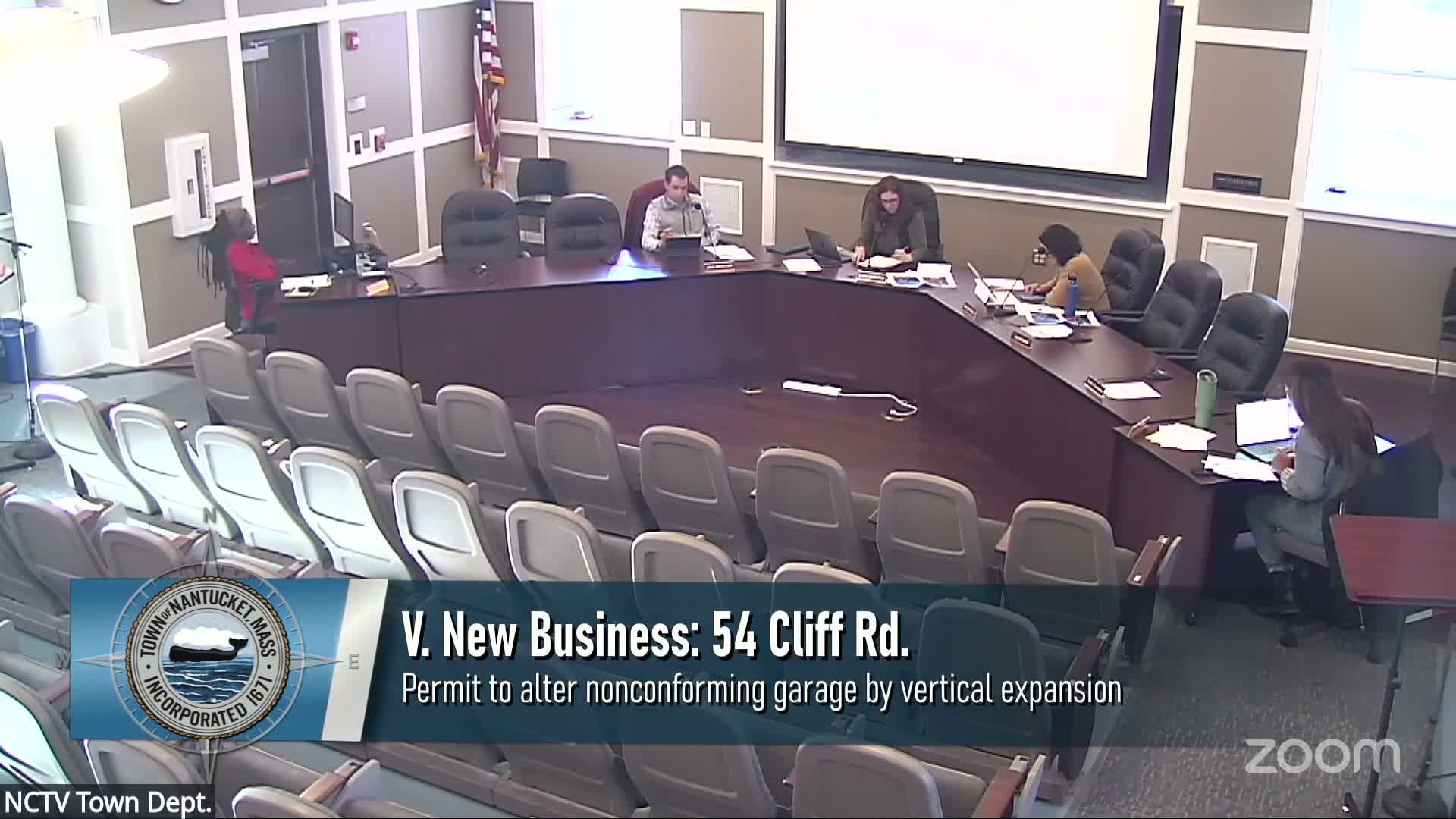 Zoning board continues review of half‑story garage addition at 54 Cliff Road amid use concerns